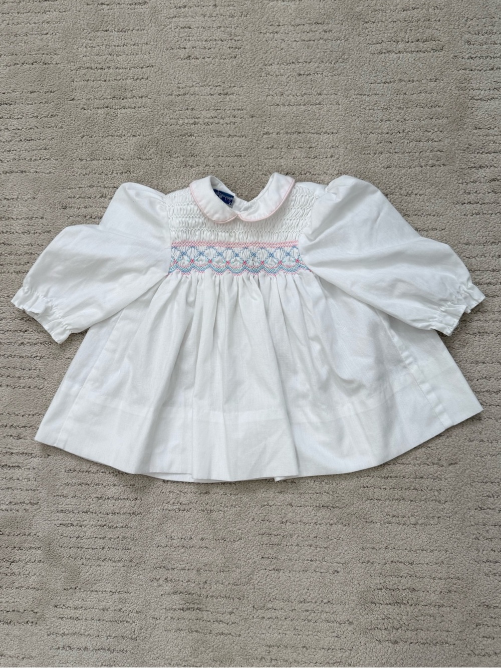 Vintage Smocked Girls' Dress with Pastel Embroidery